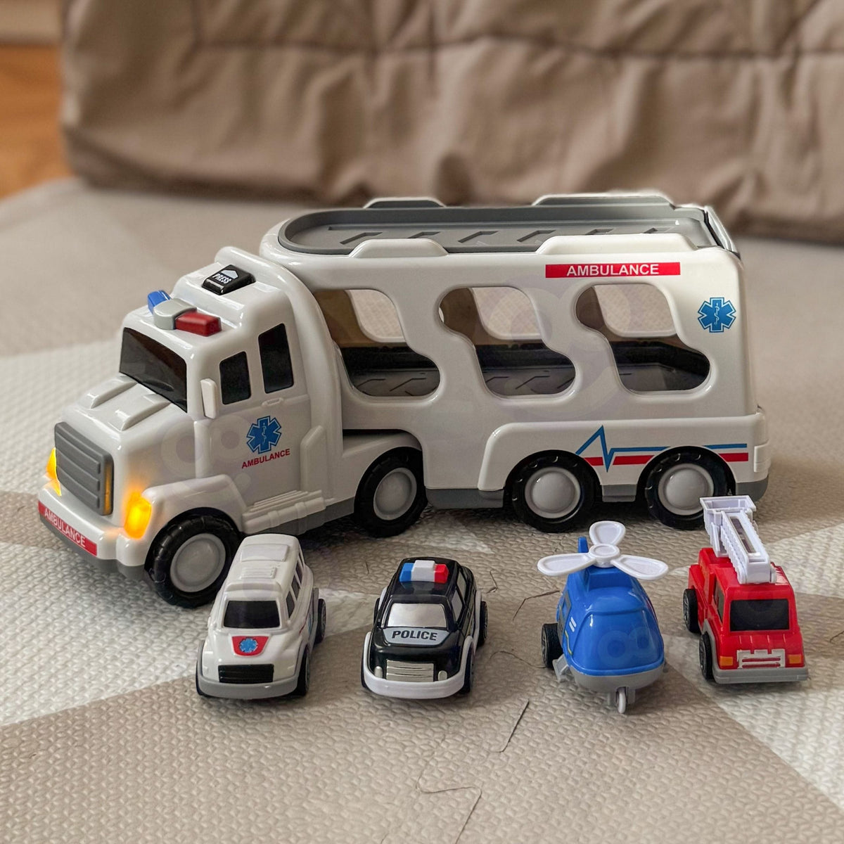 Woopie Greitosios Pagalbos Transporteris Su 4 Automobiliais Žaislinės transporto priemonės