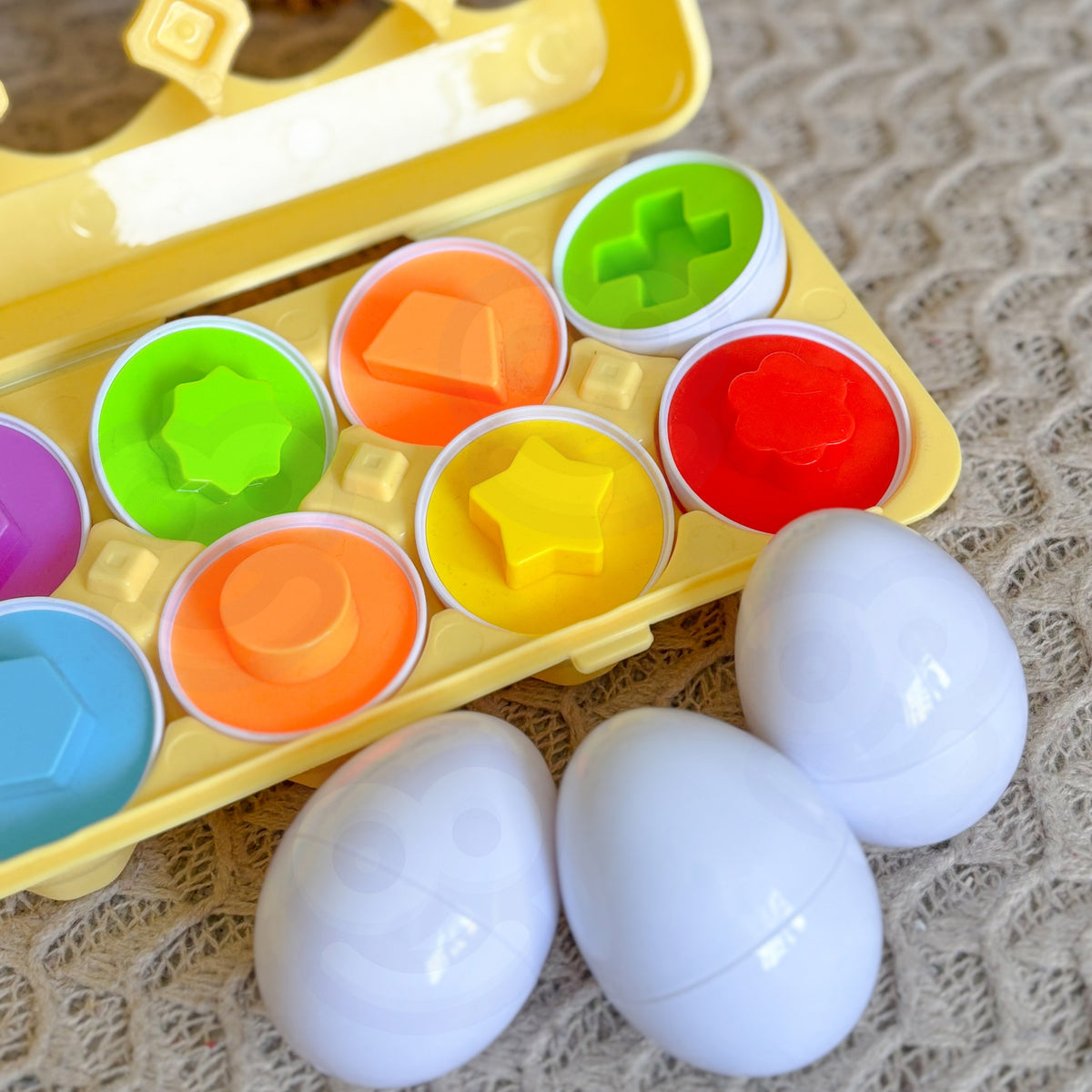 Woopie Montessori kiaušinių formų rūšiuoklė, 12 vnt.